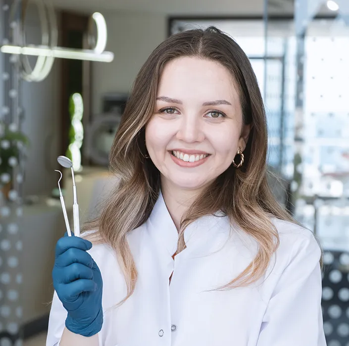 dental student with tools