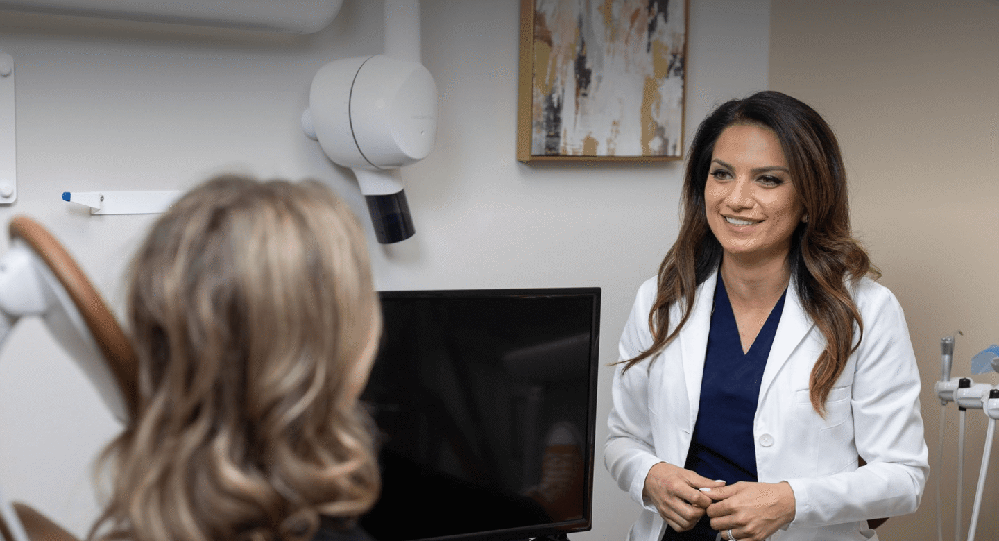 Heartland doctor with patient in exam room